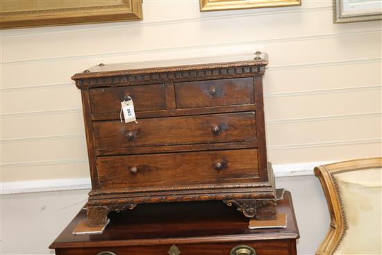 A North Italian walnut small chest of drawers W.65cm